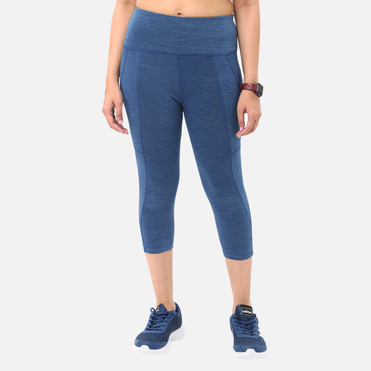 Casual womens knitted mid-blue denim yoga capris with pockets, perfect for adding functionality and style to your workout wardrobe, available online