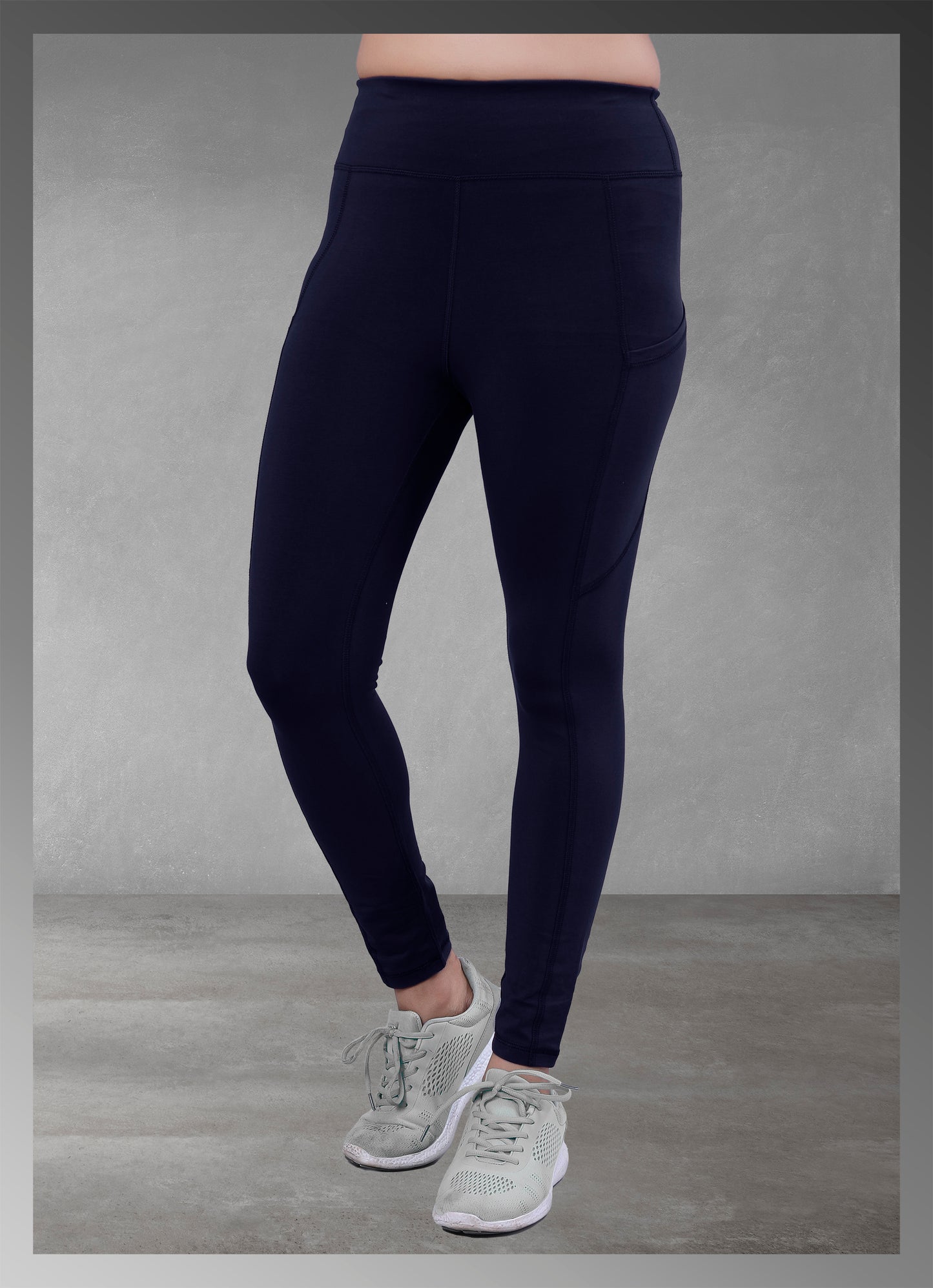 Women's navy pocket yoga wear available online, featuring a comfortable and functional design ideal for active lifestyles.