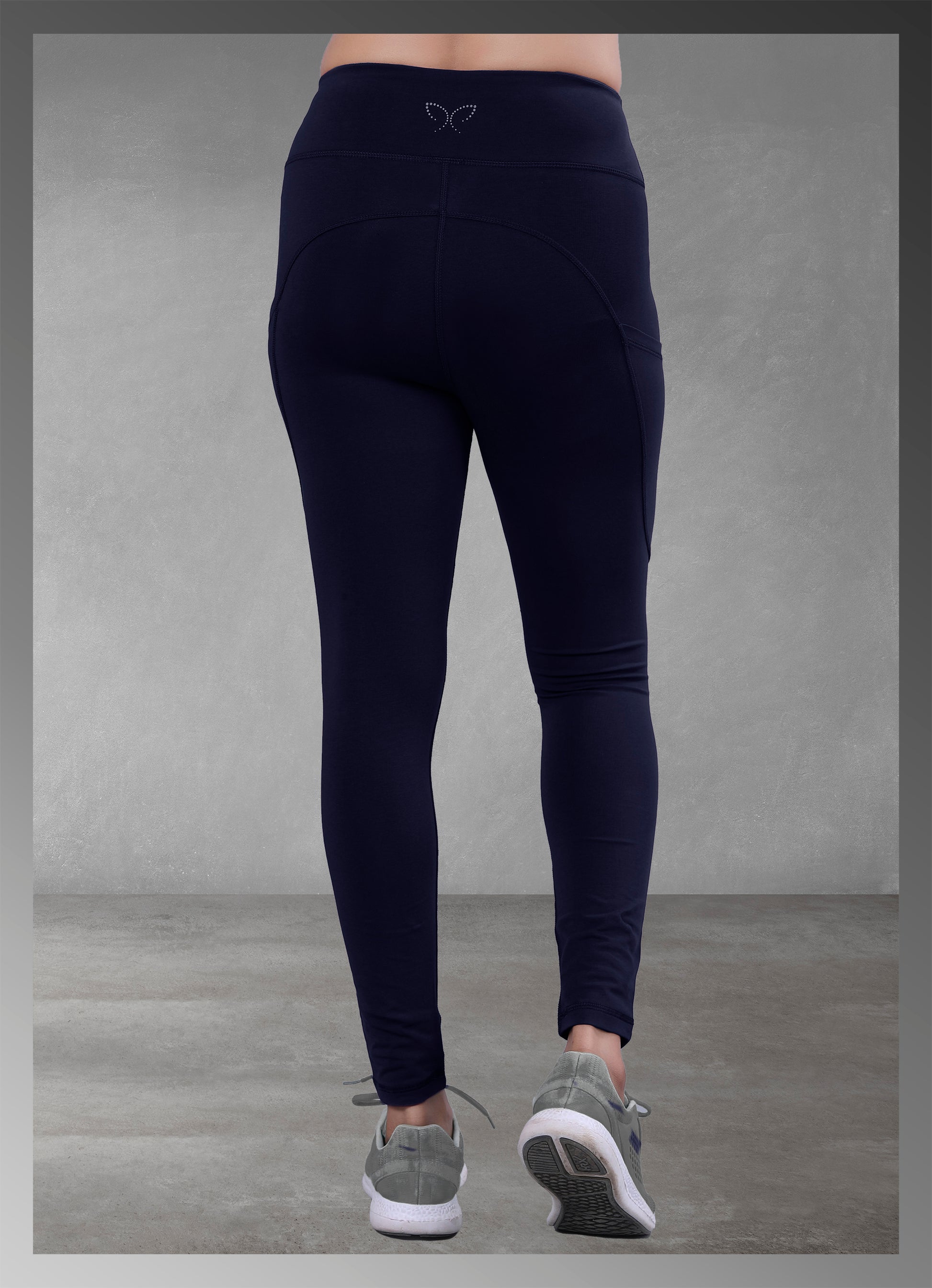 Women's navy pocket yoga wear available online, featuring a comfortable and functional design ideal for active lifestyles