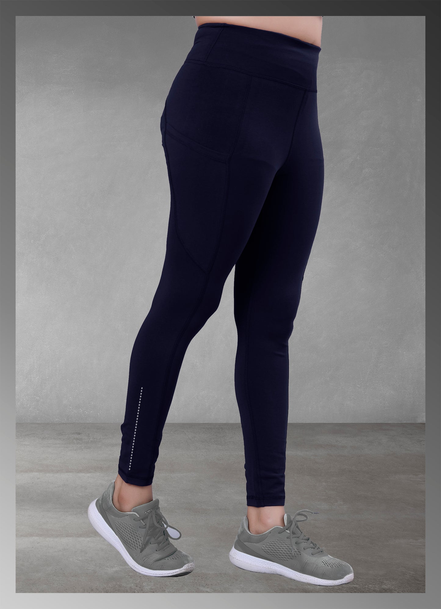 Women's navy pocket yoga wear available online, featuring a comfortable and functional design ideal for active lifestyles