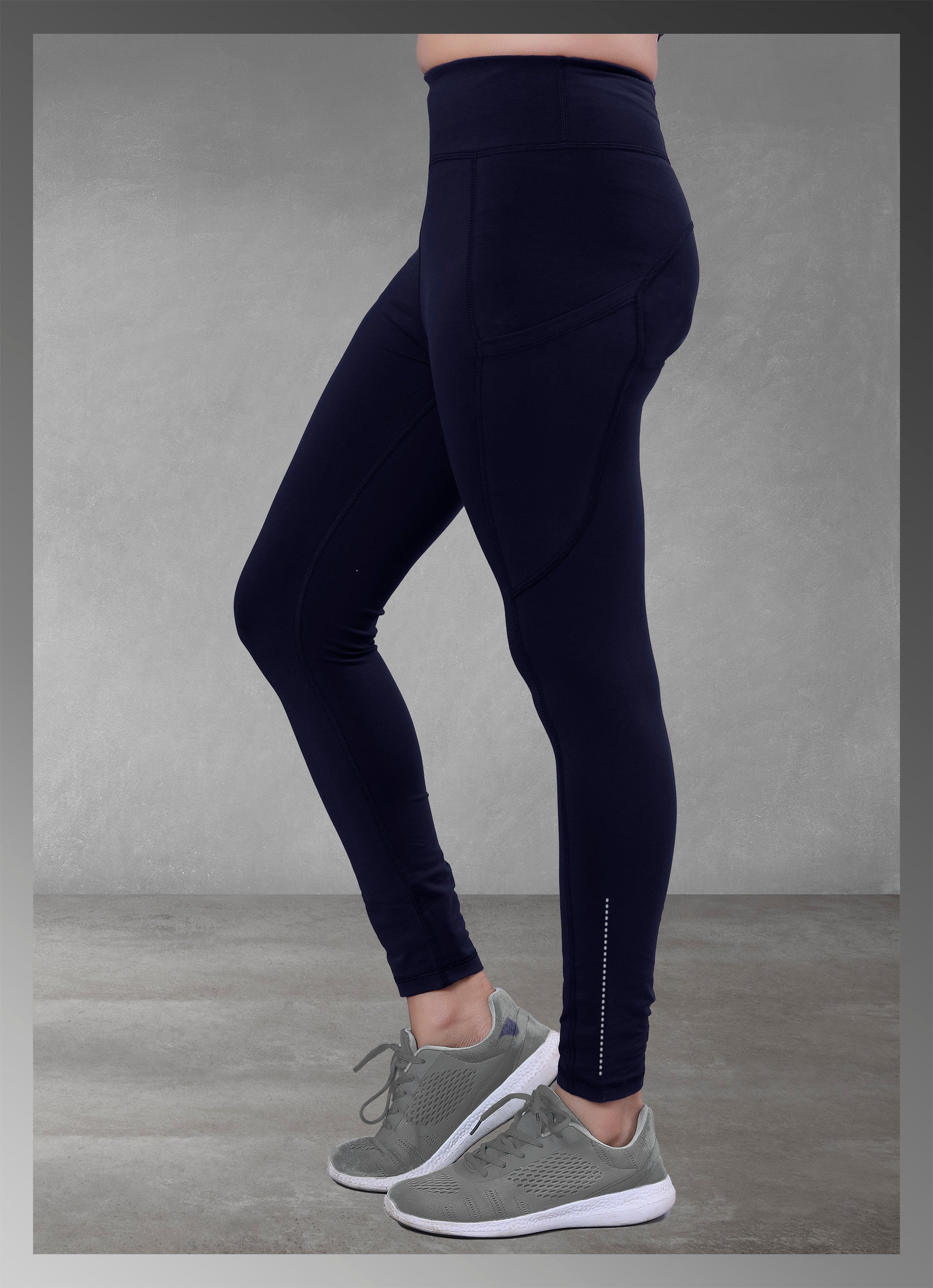 Women's navy pocket yoga wear available online, featuring a comfortable and functional design ideal for active lifestyles